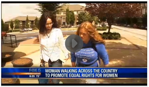 Local Atlanta activist Eliza Devine walks with Helene Swanson  of Katrina's Dream through Atlanta, GA
